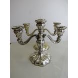 A pair of 3 branch silver candelabras, marked 830 with lion mark, height 23cms, Est £200-250
