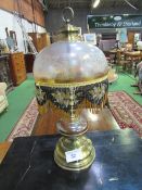 Brass table lamp with tasselled glass shade, height 57cms. Est £10-20