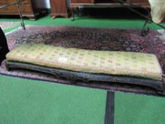 Long upholstered low stool with curved carved front, 113 x 26 x 15cms. Estimate £20-30