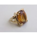 18ct gold ring with a large orange stone (size of stone 2.2mm to 1.8mm), weight 18gms. Estimate £1,