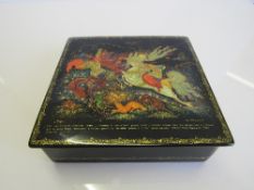 A hand painted Russian lacquer box. Estimate £50-70