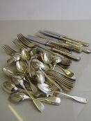 41 Guy Degreene teaspoons; 7 Guy Degreene table knives & 4 silver plated forks. Estimate £20-30