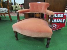 Coral upholstered open armchair with inlaid decoration to splats. Estimate £30-50