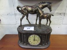 Bronze standing horses on column base with inset quartz clock. Estimate £20-40