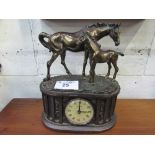 Bronze standing horses on column base with inset quartz clock. Estimate £20-40