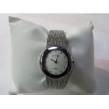 Lady's Skagen stainless steel watch, white dial with gemstone marks in original box. Est 20-30