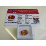 Cushion cut loose orange sapphire, 8.95ct with certificate. Estimate £40-50