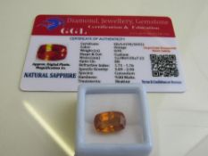 Cushion cut loose orange sapphire, 8.95ct with certificate. Estimate £40-50