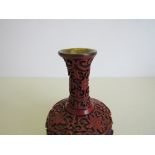 Chinese cinnabar vase on stand. Estimate £30-40