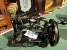 Sewing machine from James G Weir. Est £20-40 plus VAT on the hammer price