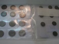 12 half crowns, some 1920's, 13 silver shillings, 1920. Estimate £30-40