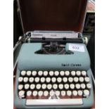Smith Corona Sterling portable typewriter in case.