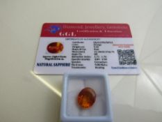 Oval cut orange sapphire, weight 9.40ct with certificate. Estimate £40-50