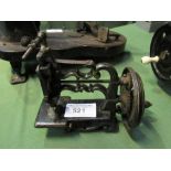 A sewing machine from James G Weir. Est £20-40 plus VAT on the hammer price
