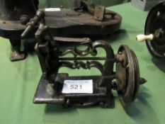 A sewing machine from James G Weir. Est £20-40 plus VAT on the hammer price