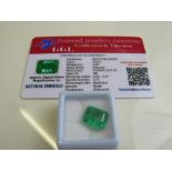 Emerald cut loose green emerald, 6.80ct with certificate. Estimate £40-50