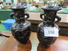 Pair of Meiji period bronze vases, height 21 cms. Estimate £50-80