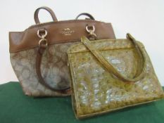 'Coach' handbag together with a vintage crocodile skin effect handbag. Estimate £15-30