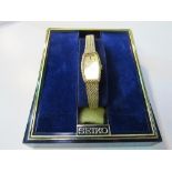 Seiko lady's dress watch with gold plated strap(boxed). Est 15-20
