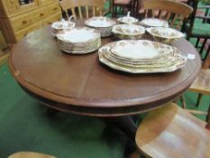 Mahogany circular table on central pedestal to 3 claw feet on casters, diameter 120cms. Estimate £