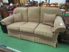 3 seater sofa by Peter Guild in harlequin pattern upholstery, 200 x 100cms. Estimate £50-100