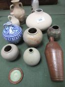 11 pieces of stoneware jugs and vases. Est 30-50