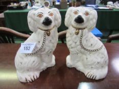 A pair of Royal Doulton white Staffordshire-type dogs. Estimate £20-30