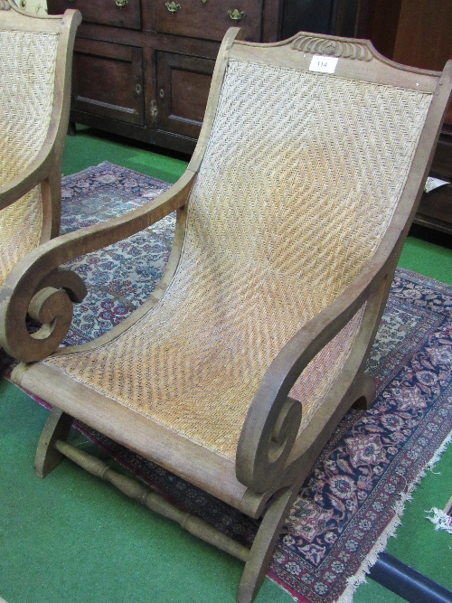 A pair of Indonesian hardwood & cane 'lazy chairs'. Estimate £80-100 - Image 3 of 5