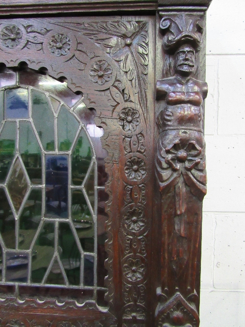 Large ornately carved continental dresser/cabinet with 2 stained glass fronted doors to cabinet over - Image 11 of 11