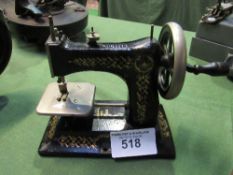 Bing sewing machine with a trade mark 'B W Bavaria'. Est £20-40 plus VAT on the hammer price
