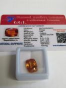 Cushion cut orange sapphire, weight 9.9ct with certificate. Estimate £40-50