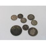 George III sixpence; George V East African shilling; George III sixpence; Queen Victoria 1885