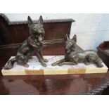 Brass coloured metal sculpture of 2 Alsatian dogs on marble base, signed, length 58cms, height