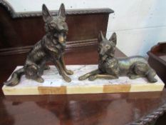 Brass coloured metal sculpture of 2 Alsatian dogs on marble base, signed, length 58cms, height