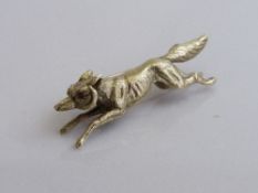 9ct gold fox brooch with ruby eyes, overall length 3.7cms. Estimate £270-290