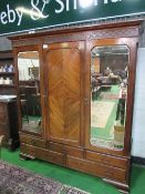 Edwardian mahogany triple fronted wardrobe with 2 bevel edged mirrored doors above 3 over 2