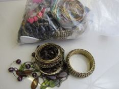 Bag of mixed costume jewellery, approx 2kg. Estimate £20-30