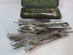 Collection of silver handled button hooks & shoe horns (over 25 pieces). Estimate £200-225