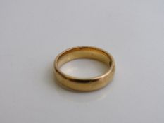 22ct gold band size L weight 5.9gms. Est £160-180