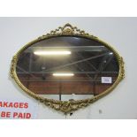 Decorative gilt oval framed wall mirror. Estimate £20-30