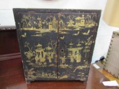Lacquer oriental cabinet with 5 interior drawers (a/f), 28 x 18 x 32cms.