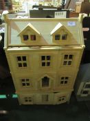 Modern 3 storey wooden doll's house c/w dolls & furniture. Estimate £50-80