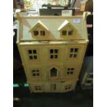 Modern 3 storey wooden doll's house c/w dolls & furniture. Estimate £50-80