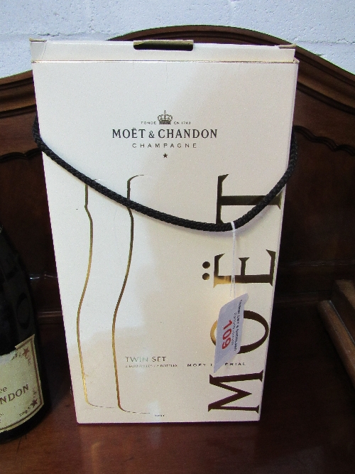 Bottle of vintage Moet et Chandon champagne in twin set gift box. Estimate £30-50