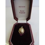 Gold on silver egg shaped locket pendant by Sarah Faberge in original case. Estimate £20-30