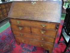 Early 19th century oak bureau (interior requires renovation) with dummy drawer over 2 over 2