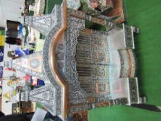 Silver coloured metal & copper decorated model temple & model swing. Estimate £50-80