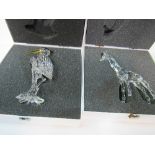 Swarovski heron, boxed together with a giraffe, boxed. Estimate £50-60