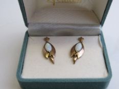 9ct gold opal earrings. Est £20-30