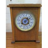 Oak cased mantel clock with ceramic face & Arabic numerals. Estimate £20-40
